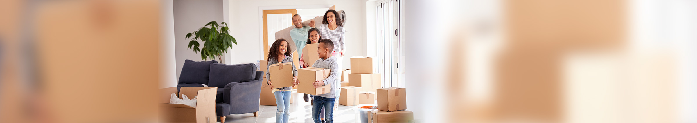 Family with moving boxes