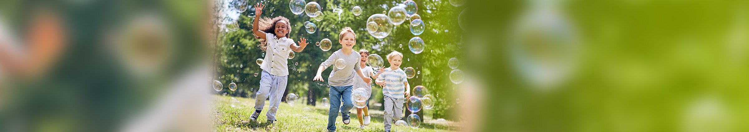 kids playing with bubbles