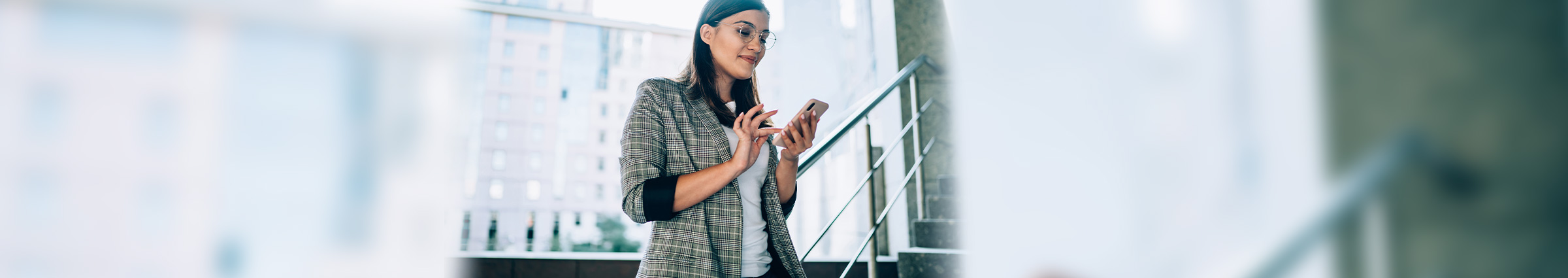 Woman on cellphone on stairway