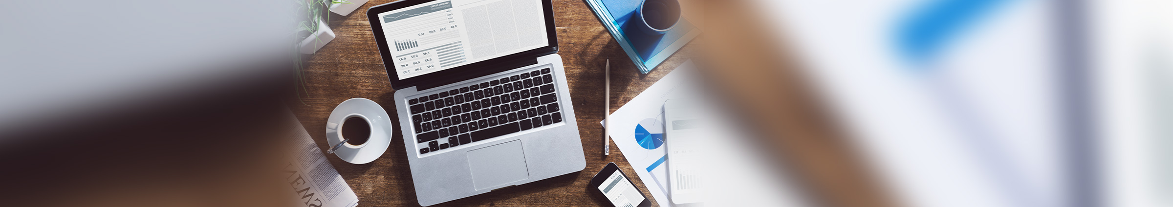 Laptop and office supplies on desk