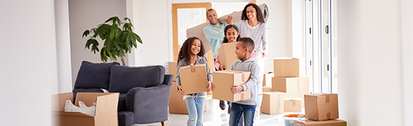 Family with moving boxes