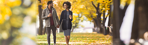 Couple walking holding hands