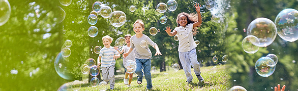 kids playing with bubbles