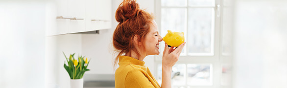 Woman smelling flower