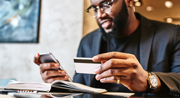 Woman making a purchase with a credit card