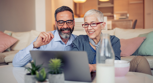 Couple looking at computer